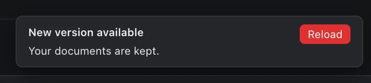 A message in koi.photo: New version available. Your documents are kept. A red Reload button.